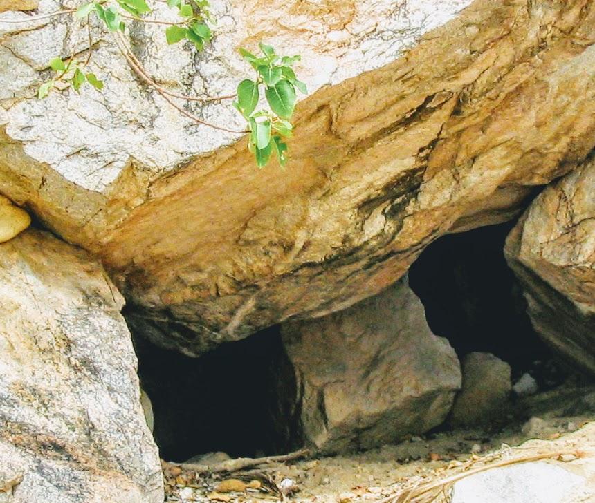 This image has an empty alt attribute; its file name is Cave-and-rock.jpg