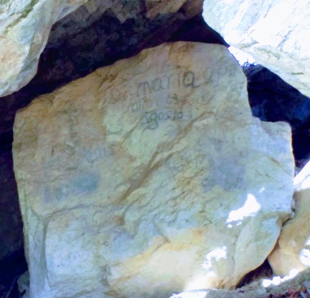 This image has an empty alt attribute; its file name is Rock-with-inscription-1024x985.jpg